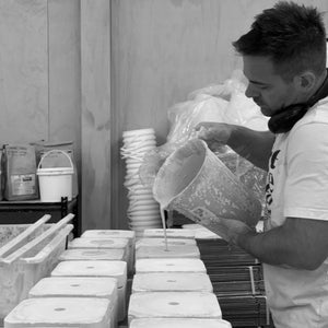Sam Slip-Casting in studio, demonstrating handmade ceramics